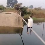 Video: Man Uses Pipe To Cross Collapsed Bridge In Telangana