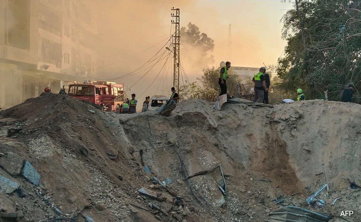 Lebanon Rescuer Picks Up “Pieces” Of Father After Israel Strike