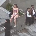 Woman ‘violently arrested’ after stripping to protest strict Islamic dress code – reports