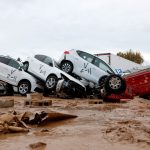 Angry crowds hurl mud and insults at King of Spain as he visits town devastated by floods