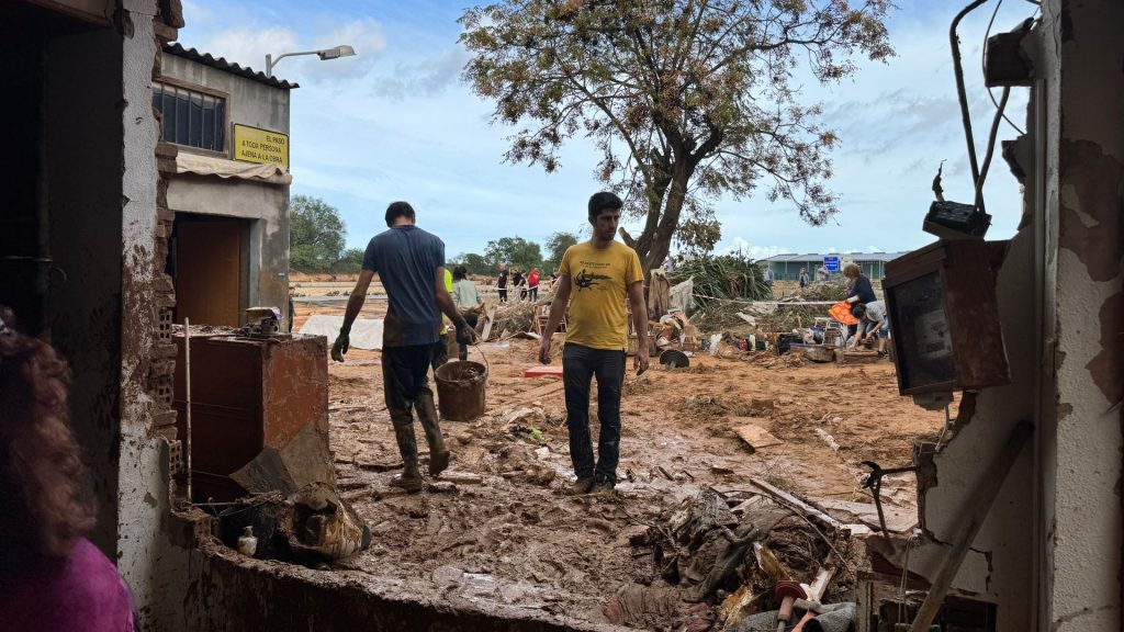 Family left with nothing forced to salvage precious memories after home devastated by floods